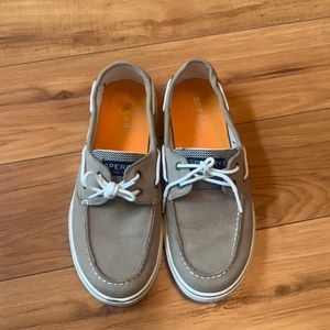 Tan colored cavas style Sperry shoes in 5Y.